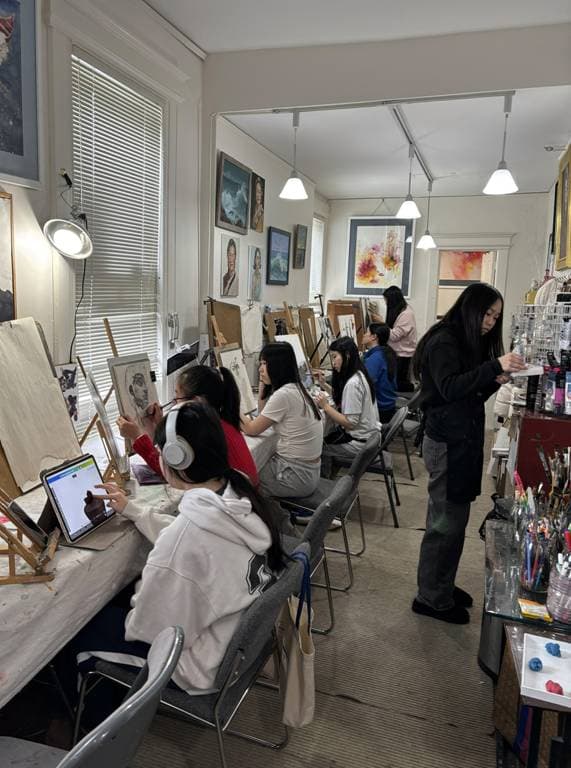 Interior of Li Zhai Art Schools studio with traditional Chinese painting workspace